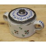 An 18th century Delft ware two handled posset pot and associated cover with white metal mounts, 8