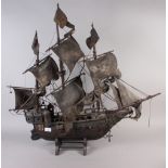 A painted wood model of a galleon, 35" long