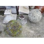 A stone ball, 12 1/2" high, another similar concrete ball and concrete stands, 14 1/2" high