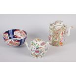 A famille rose teapot, decorated figures, flowers and birds with matched lid, 7" high, another