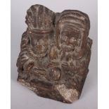 A 19th century plaster bookend, in the form of two seated figures, 4 1/2" high