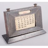 An Art Deco silver desk calendar with engine turned decoration, 4 1/4" high