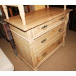 A pine pier chest of three long drawers, on bun feet, 38" wide