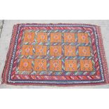 A vintage finely woven kelim rug with lattice design on an orange ground and multi-borders, 61" x