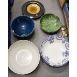 A blue and white washbowl, a splash glazed bowl, 12 1/2" dia, a studio pottery bowl, three other