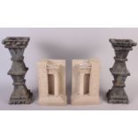 A pair of geometric form candlesticks and a pair of Doric bookends, 8 3/4" high