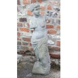 A cast stone figure of Venus de Milo, 34" high (cracked neck)
