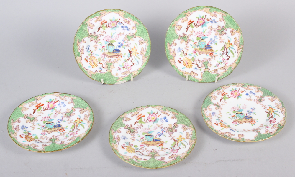 Five late 19th century tea plates with floral decoration and green borders, 5 1/2" dia