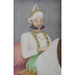 A 19th century Anglo Indian watercolour of a Maharajah, 6 1/4" x 4 1/4", in blue mount and strip