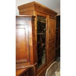 A gentleman's ash Beaconsfield wardrobe with bevelled mirrored door and single cupboard over three