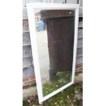 A white painted wall mirror, 24" x 14"