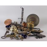 A wrought iron spiral candlestick, a copper chestnut roaster, a chest strap and five horse brasses