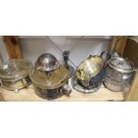 A glass biscuit barrel with silver plated mounts, glass casserole dishes, in plated frames, and