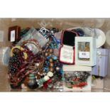 A selection of mainly costume jewellery, some silver and a number of rosaries and religious pendants