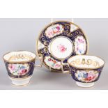 A New China Works bone china floral and gilt decorated trio with Lynn Rose collector's label