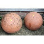 Two ornamental terracotta garden balls, 13 1/2" high