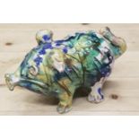 An Italian majolica pig with splashed decoration, 10" long