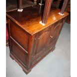 A carved oak two door side cabinet, fitted one drawer, 32" wide x 19" deep x 34" high