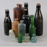Two stoneware ink bottles, three glass ink bottles and other glass bottles, various