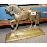 A pair of brass shire horse andirons, a silver plated salver, a plated teapot stand, a selection