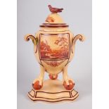 A late 18th century English pottery pastel jar and cover with landscape panels, on three claw and