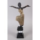 A brass and bronze patinated Art Deco style figure of a dancer, on black marble base, 14 1/2" high