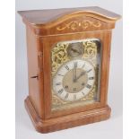 A Gustav Becker walnut cased mantel clock with silvered and gilt dial and Roman numerals, 16"