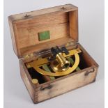 A lacquered brass semi circumferentor, in wooden case