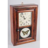 A Seth Thomas rosewood cased drop dial clock with white painted dial and Roman numerals, 16 1/4"