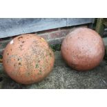 Two ornamental terracotta garden balls, 13 1/2" high