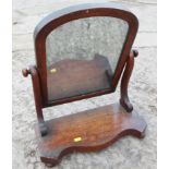 A 19th century mahogany swing frame toilet mirror, on plateau base, 18" wide x 8" deep x 21" high