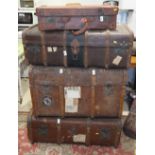 Three canvas bound trunks and three leather suitcases