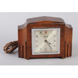 A Ferranti 1930s oak cased electric mantel clock, 7" high