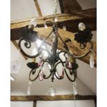 A 19th century wrought iron scroll work four-light chandelier, now converted to electricity, 14"