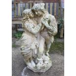 A cast sandstone model of Romeo and Juliet embracing, 28" high