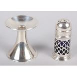 A silver pepperette with lattice work decoration and a silver candle holder, 3.1oz troy approx
