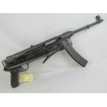 An deactivated (EU Spec) Yugoslavian M56 sub machine gun, Cold War era with folding stock,