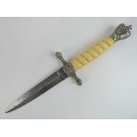 A German Kriegsmarine Officers short dagger with celluloid swirl pattern grip,