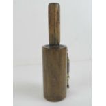 A vintage home made trench type hand held wooden and brass 'cannonade',