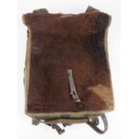 A WWII Third Reich Military Alpine troops issue Tornister back pack dated 1941 with Boar fur cover.