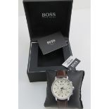 A Hugo Boss stainless steel wristwatch in as new condition complete with box and papers,