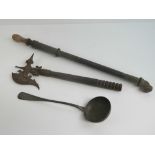 A 19th century pewter ladle, a decorative 'axe' for wall mounting,