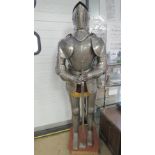 A fine full size reproduction suit of armour complete with helmet, breast plate, gauntlets,
