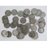 A quantity of half silver shillings, 1921-47. Total weight 7.23ozt.