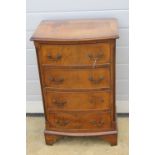 A reproduction Georgian style short chest of four drawers, 49cm wide.