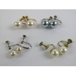 A pair of silver and pearl screw back earrings,