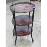 A continental inlaid three-tier side table inlaid with rose and boxwood and having pierced gallery