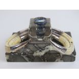 An unusual HM silver and pig tusk inkwell,