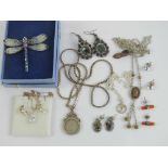 A quantity of assorted silver and costume jewellery including a suite of cz silver jewellery,