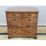 A good late Georgian chest of two short over three long graduating drawers,